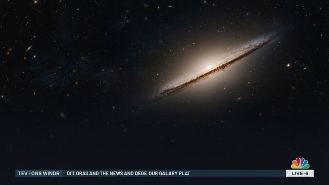 Space - Hubble Captures Edge-On View of Spiral Galaxy NGC 1827