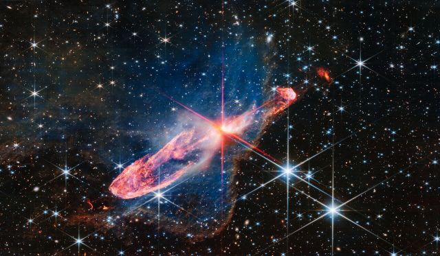 Space - Infant binary stars blast supersonic jets into surrounding nebula