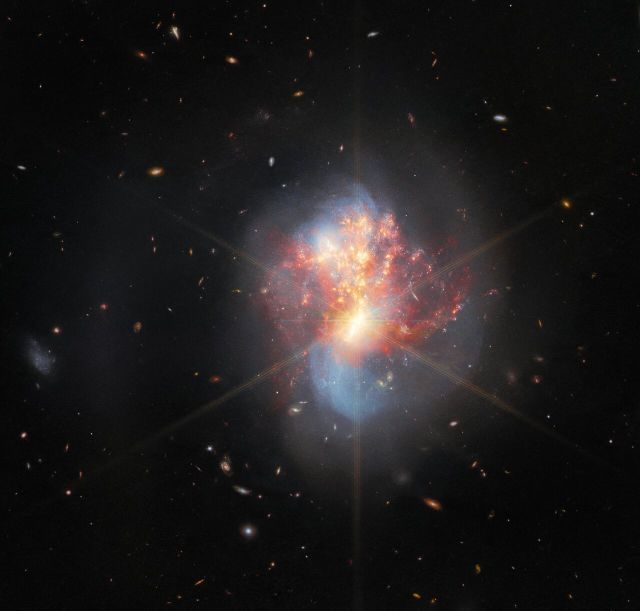 Space - IC 1623: Merging galaxies ignite a furious starburst