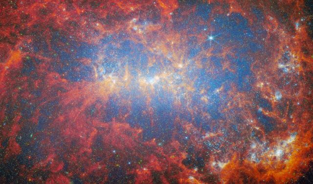 Space - NGC 4449: explosive star formation in a dwarf galaxy