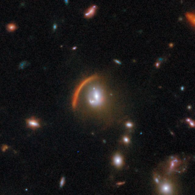 Space - Webb unmasks a hidden lensed galaxy behind cosmic curvature