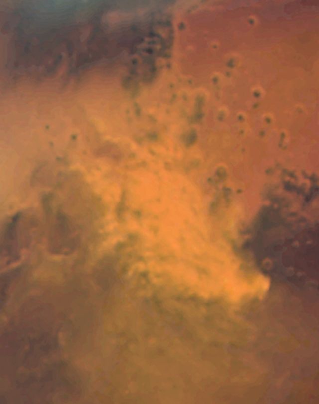 Space - Hubble tracks regional dust storm sweeping across Mars