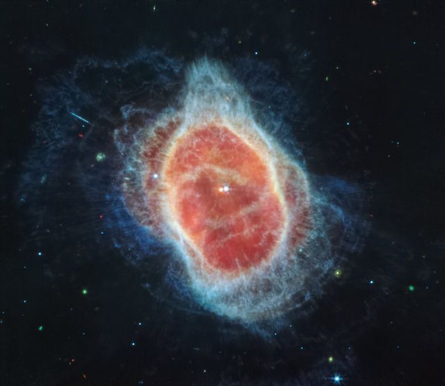 Space - Southern Ring Nebula: a dust-cloaked dying star