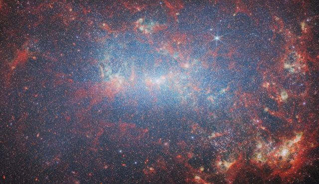 Space - Dwarf galaxy NGC 4449: widespread starburst ignites new suns