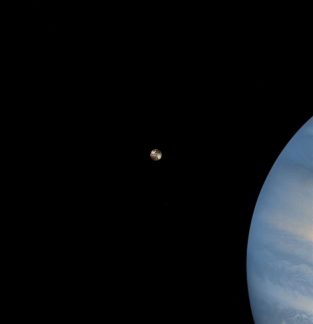 Space - Io crosses Jupiter: Hubble monitors a volcanic world