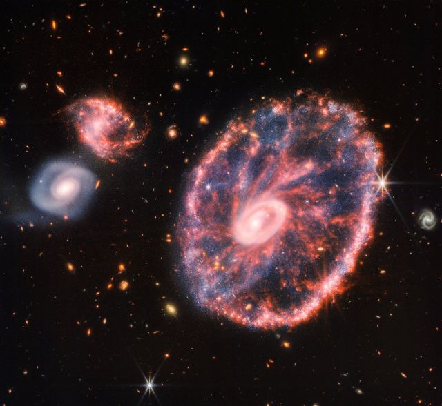 Space - Cartwheel Galaxy: Cosmic impact carves vast expanding rings