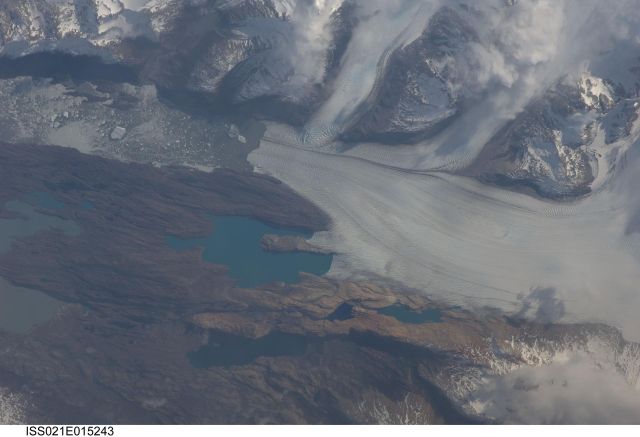 Planet Earth - Upsala Glacier: Icebergs carrying land debris into Lake Argentina
