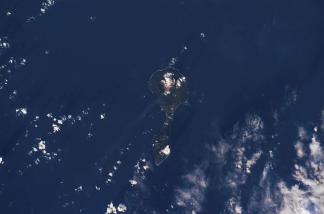 Planet Earth - Pagan Island: Twin volcanoes along the deep Mariana Trench