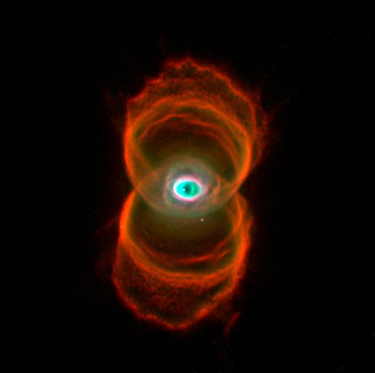Astronomy - Engraved Hourglass Nebula: a dying star's geometric cosmic sculpture