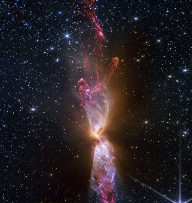 Space - Lynds 483: Webb captures ejections from twin newborn stars