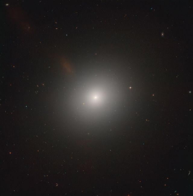 Astronomy - Messier 105: Leo's giant elliptical galaxy